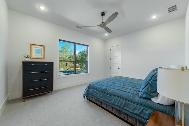 carpeted bedroom featuring ceiling fan