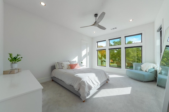 carpeted bedroom with baseboards, recessed lighting, visible vents, and ceiling fan