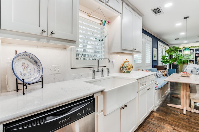 kitchen with stainless steel dishwasher, dark wood-type flooring, sink, decorative light fixtures, and white cabinets