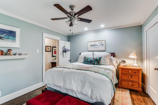 bedroom featuring ceiling fan, dark hardwood / wood-style flooring, and ornamental molding