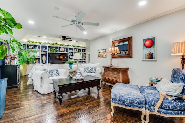 living room with ceiling fan, dark hardwood / wood-style floors, and crown molding