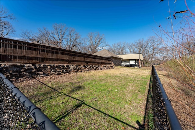 view of yard with a carport