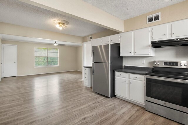 kitchen with appliances with stainless steel finishes, a textured ceiling, white cabinetry, and ceiling fan