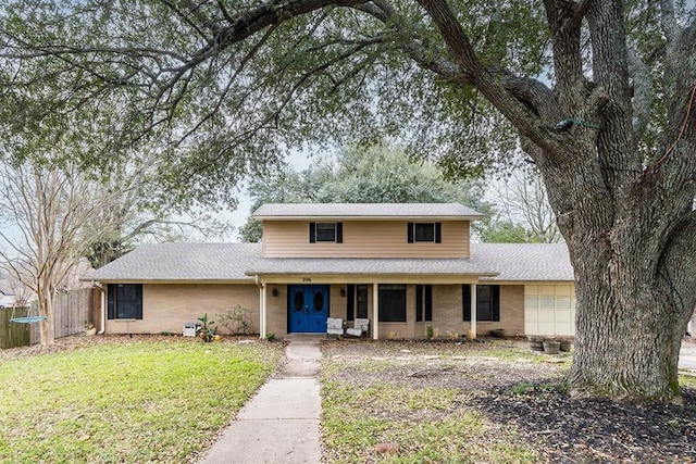 front of property featuring a front lawn