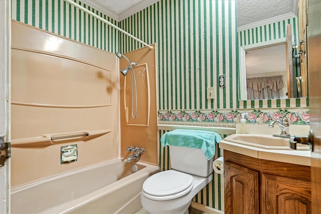 full bathroom with ornamental molding, vanity, a textured ceiling,  shower combination, and toilet