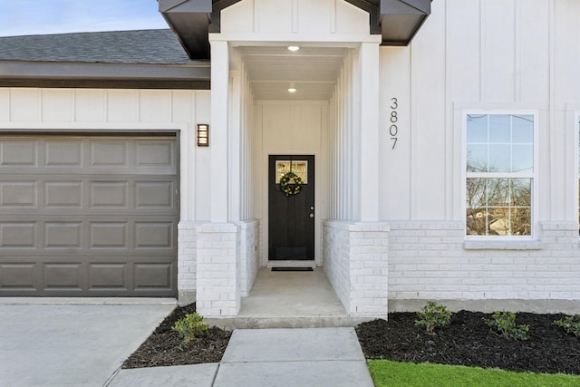 property entrance featuring a garage