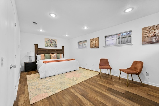 bedroom featuring dark hardwood / wood-style floors