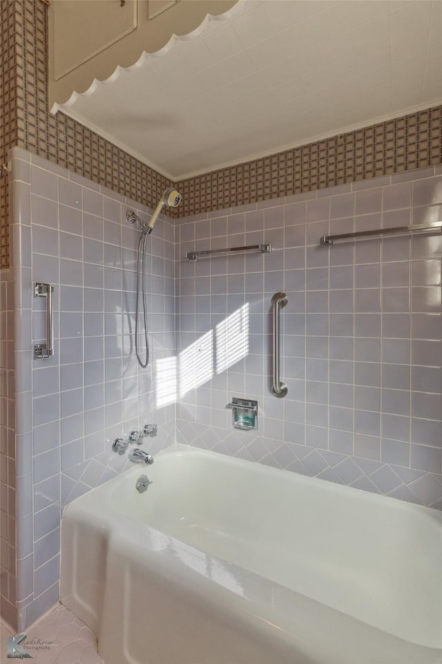 bathroom with bathing tub / shower combination and tile patterned floors