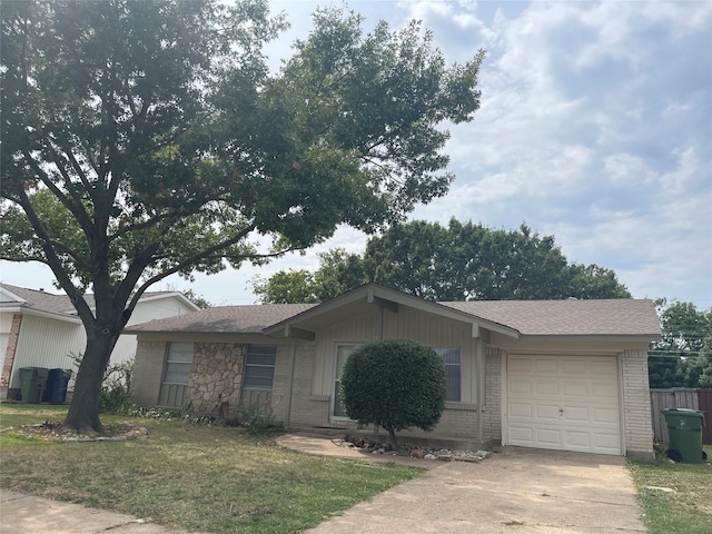 ranch-style home with a garage and a front lawn