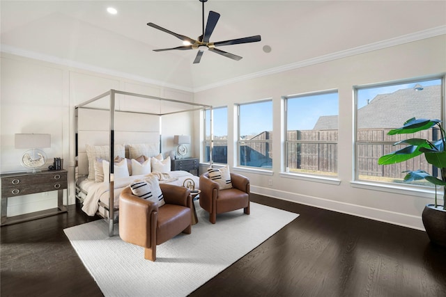 bedroom with dark wood-type flooring, ornamental molding, and multiple windows