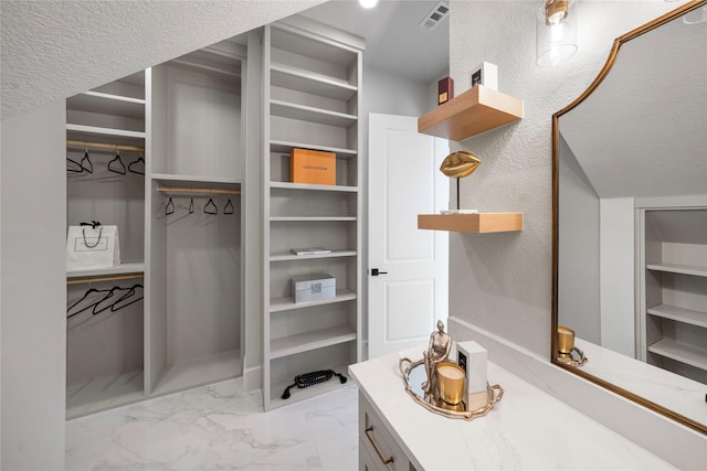 bathroom featuring a textured ceiling