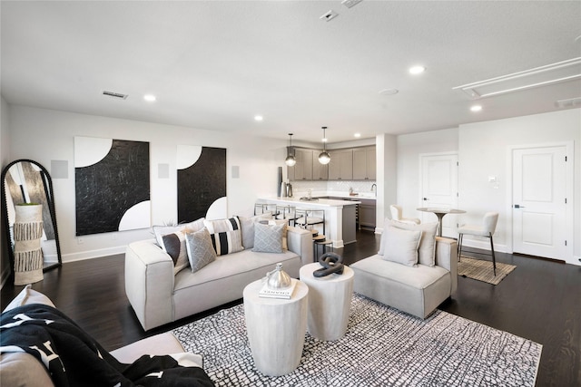 living room featuring dark hardwood / wood-style floors