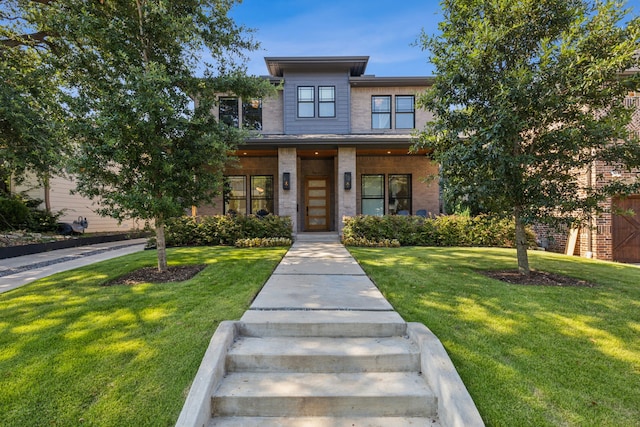 view of front of home featuring a front lawn