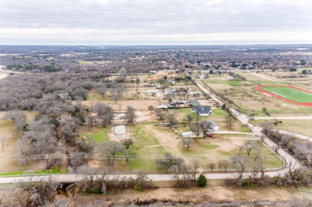 birds eye view of property featuring a rural view