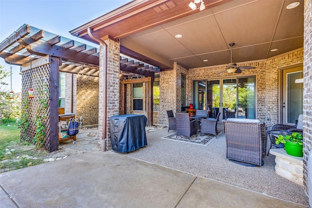 view of patio featuring a pergola and ceiling fan