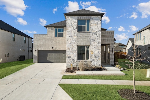 view of front of property featuring a front lawn, a garage, and cooling unit