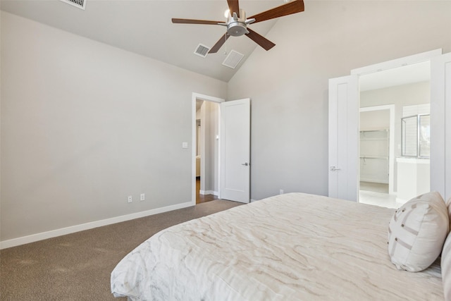 carpeted bedroom featuring ceiling fan, a walk in closet, high vaulted ceiling, and a closet