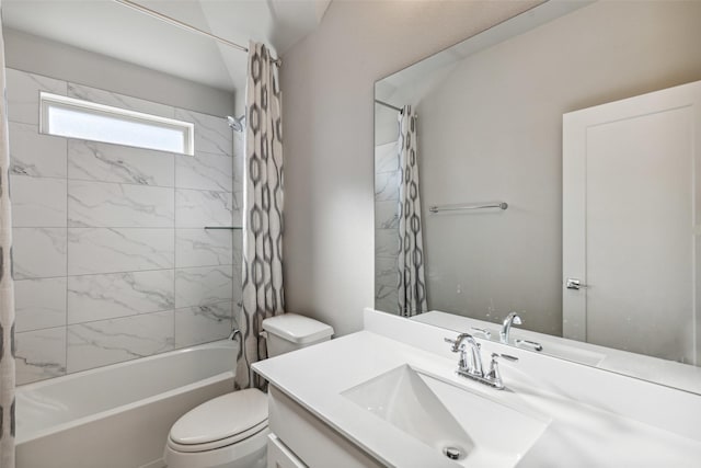 full bathroom featuring shower / bath combo, toilet, and vanity