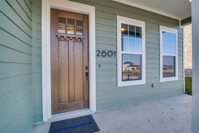 doorway to property with a porch