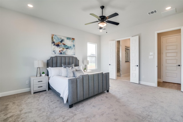 carpeted bedroom featuring ceiling fan