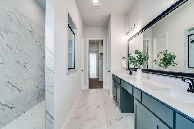 bathroom with vanity and walk in shower