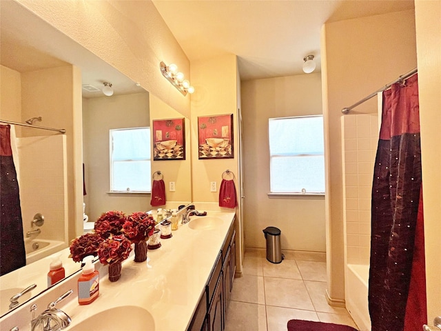 bathroom featuring vanity, shower / bath combo, and tile patterned flooring