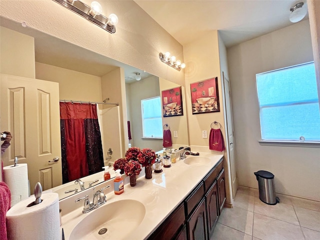 bathroom with vanity, a shower with shower curtain, and tile patterned flooring