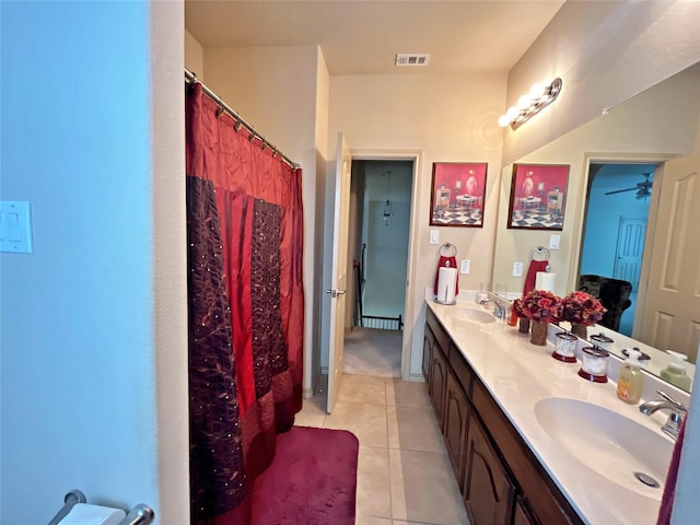 bathroom featuring vanity and tile patterned flooring