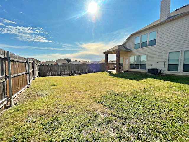 view of yard featuring central AC unit