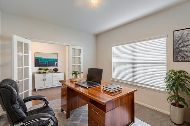 kitchen featuring stainless steel appliances, a center island with sink, white cabinets, and backsplash