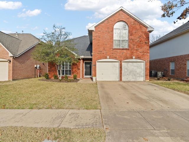 view of property featuring a garage, a front lawn, and cooling unit