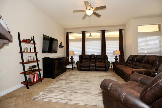 living room featuring light carpet and ceiling fan