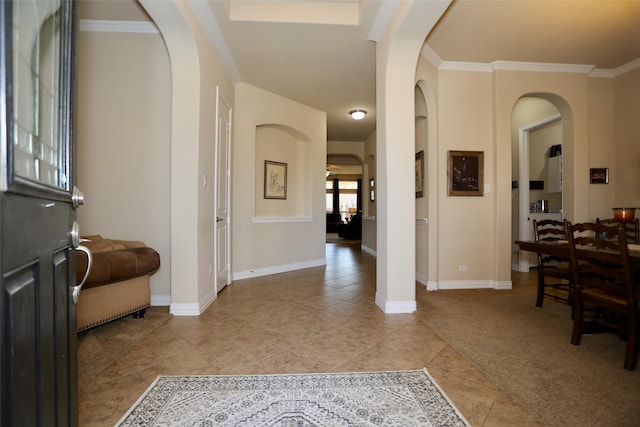 tiled entryway with crown molding