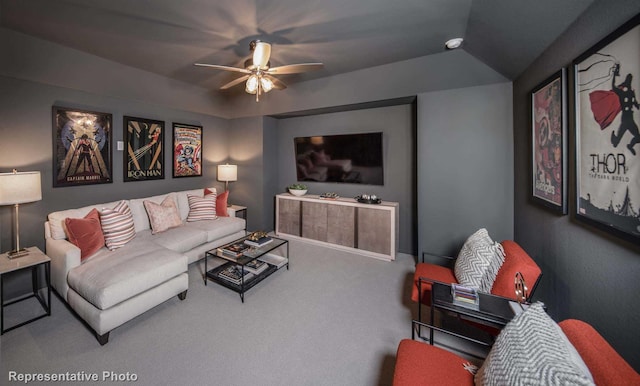 carpeted living room featuring ceiling fan