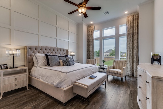 bedroom with ceiling fan, dark hardwood / wood-style flooring, and crown molding