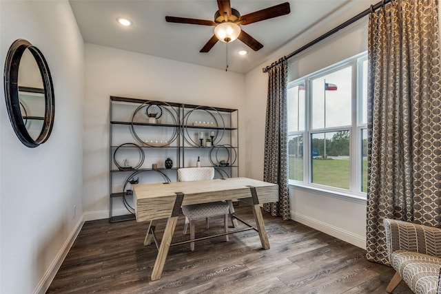 office area with plenty of natural light, dark hardwood / wood-style floors, and ceiling fan