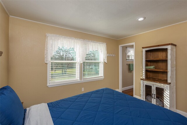 7425 Hickey Rd, Azle, TX 76020 - bedroom with baseboards and recessed lighting