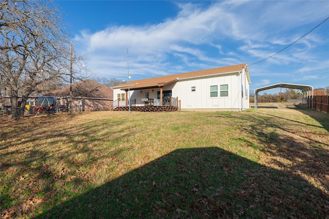 7425 Hickey Rd, Azle, TX 76020 - back of house featuring board and batten siding, a carport, and a wooden deck