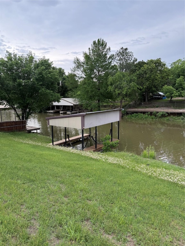 7425 Hickey Rd, Azle, TX 76020 - view of community featuring a lawn, a water view, and a boat dock