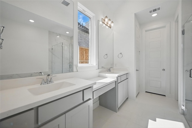 bathroom with visible vents, recessed lighting, a marble finish shower, and vanity