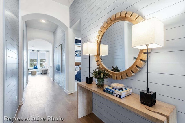 corridor featuring hardwood / wood-style floors