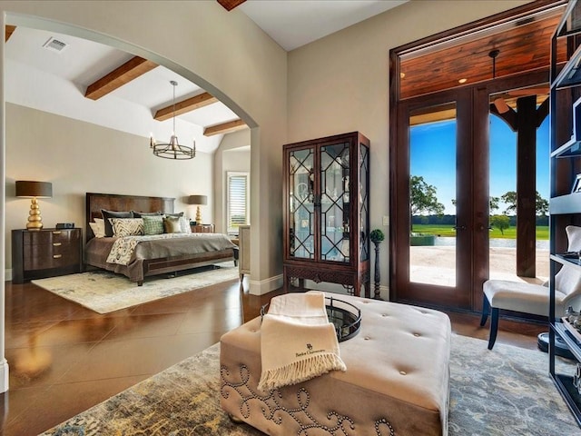 tiled bedroom featuring visible vents, beam ceiling, access to outside, arched walkways, and an inviting chandelier