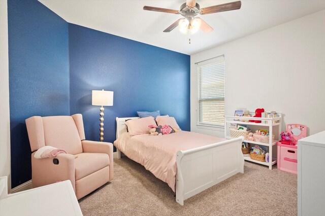 carpeted bedroom with ceiling fan