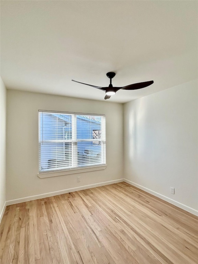 unfurnished room with ceiling fan and light hardwood / wood-style flooring