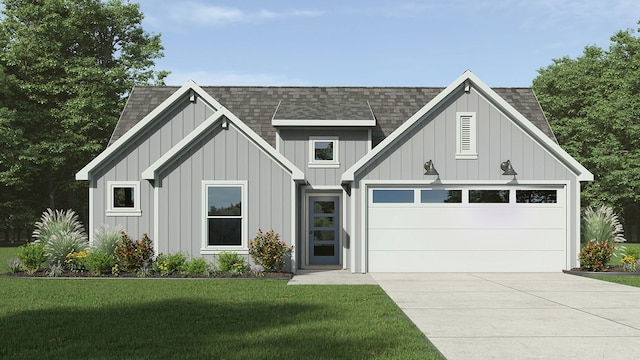 view of front of home with a garage and a front yard