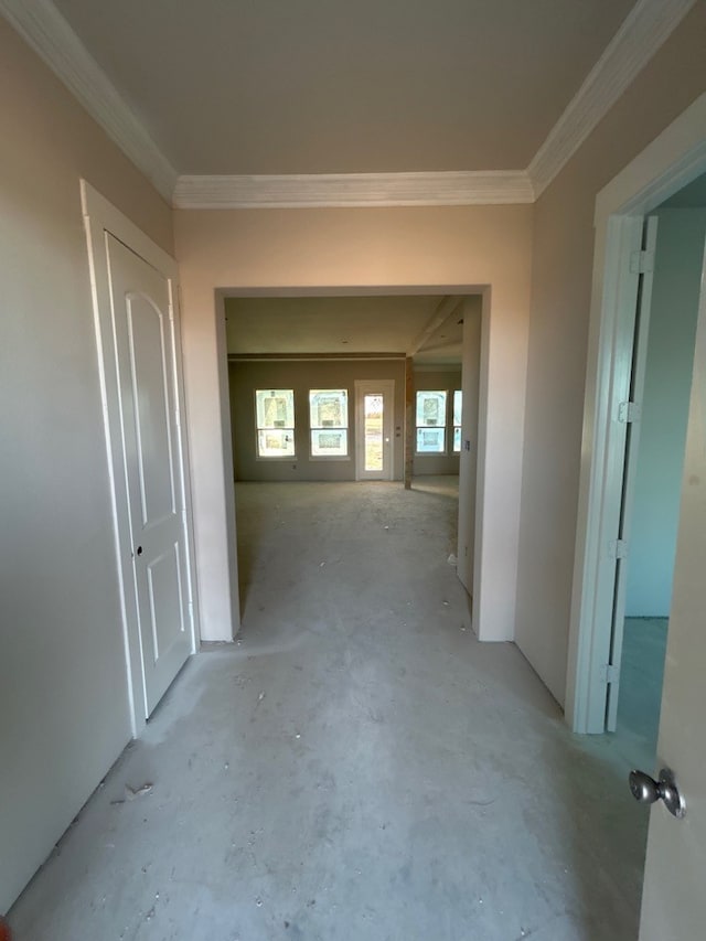 corridor featuring crown molding