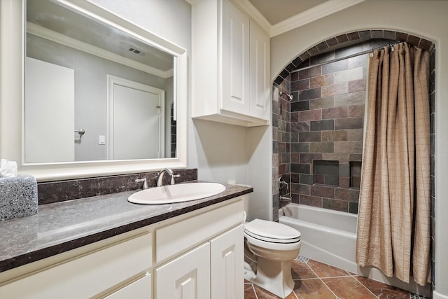 full bathroom featuring shower / tub combo, vanity, crown molding, tile patterned flooring, and toilet