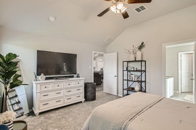 carpeted bedroom with ceiling fan and lofted ceiling