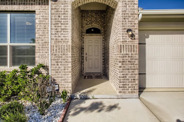 property entrance featuring a garage