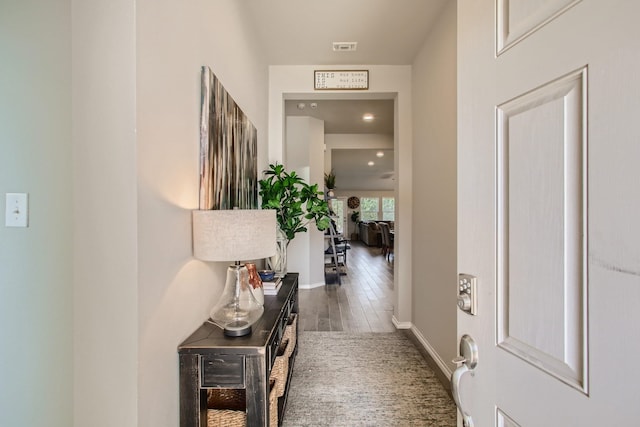 hall featuring dark hardwood / wood-style floors